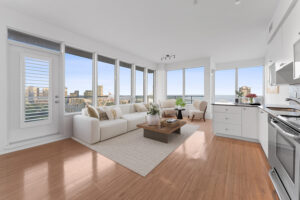 JUST LISTED! Spectacular Sub-Penthouse Corner Suite with Sensational Sunset & Lavish Lake Views