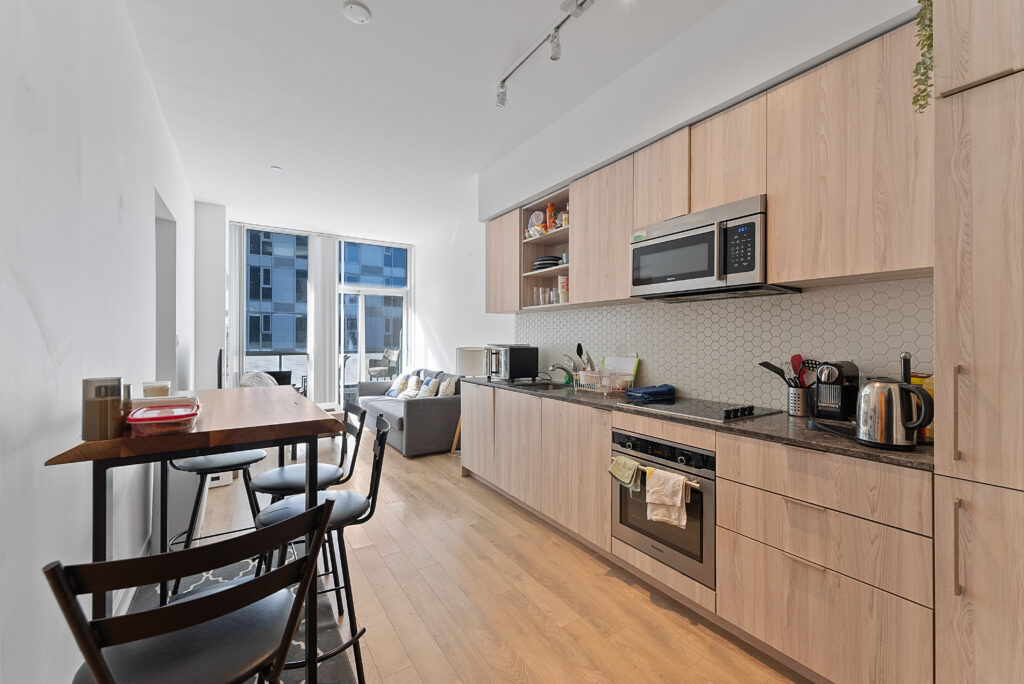 JUST LISTED! Loft-Style 2+1 Bed 2 Bath Suite with Parking at Playground Condos!